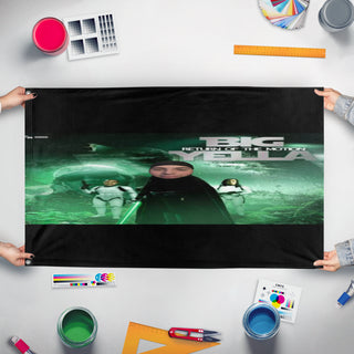 A mockup of the custom flag 'Return of the motion flag' held up on a table during print checking