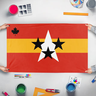 A mockup of the custom flag 'The Canada union or TCU flag' held up on a table during print checking