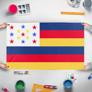 A mockup of the custom flag 'Dinoland flag' held up on a table during print checking