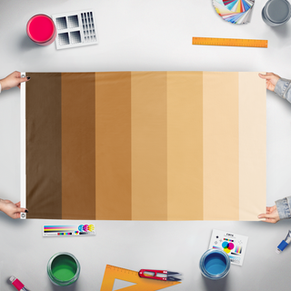 A mockup of the custom flag 'Tonebow flag' held up on a table during print checking