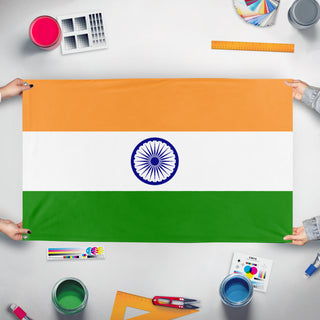A mockup of the custom flag 'India flag' held up on a table during print checking