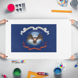 A mockup of the custom flag 'T flag' held up on a table during print checking