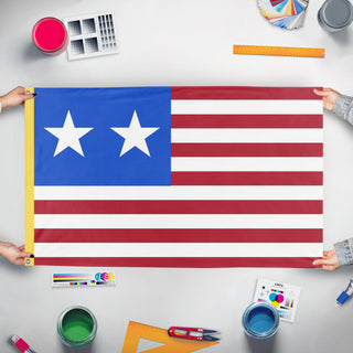 A mockup of the custom flag 'Western Forces With Smaller Stars flag' held up on a table during print checking