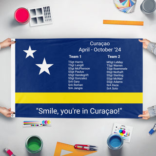 A mockup of the custom flag 'Curacao flag' held up on a table during print checking