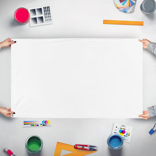 A mockup of the custom flag 'nothing. flag' held up on a table during print checking