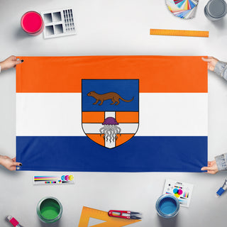 A mockup of the custom flag 'Presidential Republic of Jasonia/Jasonia flag' held up on a table during print checking
