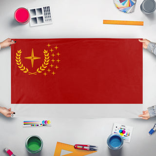 A mockup of the custom flag 'URSA flag' held up on a table during print checking