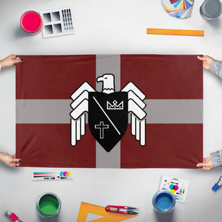 A mockup of the custom flag 'Basil Cross flag' held up on a table during print checking