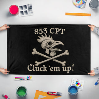 A mockup of the custom flag 'C.H Replacement flag' held up on a table during print checking