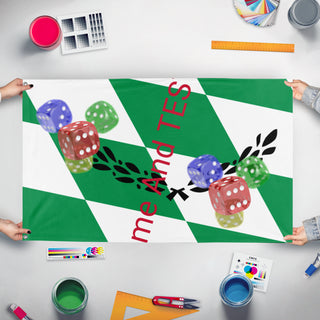 A mockup of the custom flag 'T flag' held up on a table during print checking