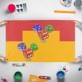 A mockup of the custom flag 'T flag' held up on a table during print checking