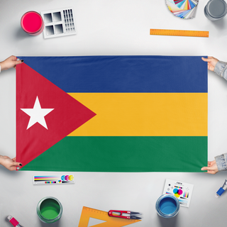 A mockup of the custom flag 'Rukhansas flag' held up on a table during print checking