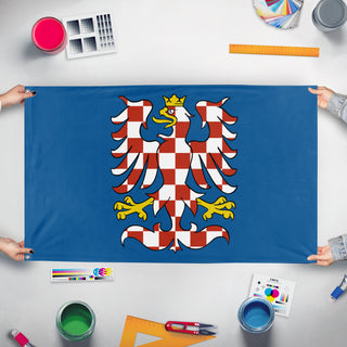 A mockup of the custom flag 'moravia_BOA flag' held up on a table during print checking