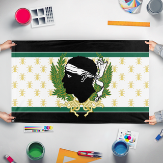 A mockup of the custom flag 'Imperu Federale Corsu flag' held up on a table during print checking