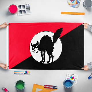 A mockup of the custom flag 'Sabocat flag' held up on a table during print checking