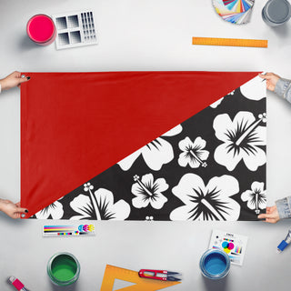 A mockup of the custom flag 'Aloha-Anarchy flag' held up on a table during print checking