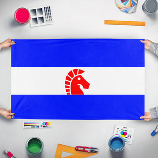 A mockup of the custom flag 'Tricoslavia flag' held up on a table during print checking