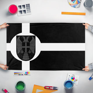 A mockup of the custom flag 'BWR flag' held up on a table during print checking