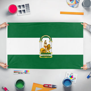 A mockup of the custom flag 'Andalusia' held up on a table during print checking