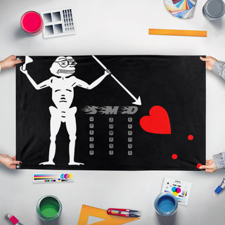 A mockup of the custom flag 'PEPESMD flag' held up on a table during print checking