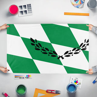A mockup of the custom flag 'T flag' held up on a table during print checking