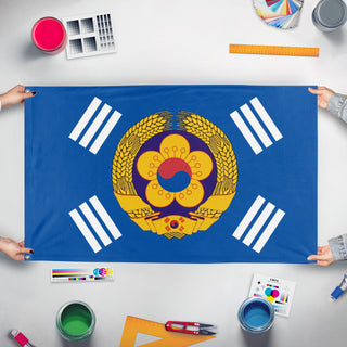 A mockup of the custom flag 'Peoples Republic of Korea flag' held up on a table during print checking