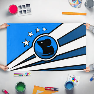 A mockup of the custom flag 'Mouse Flag' held up on a table during print checking