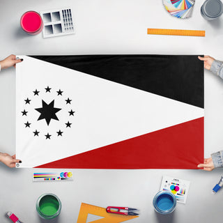 A mockup of the custom flag 'Workers party of Pluto  flag' held up on a table during print checking