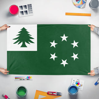 A mockup of the custom flag 'New England flag' held up on a table during print checking