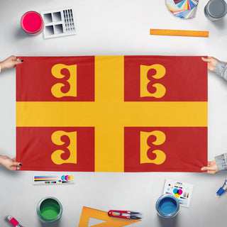 A mockup of the custom flag 'Byzantine Empire flag' held up on a table during print checking