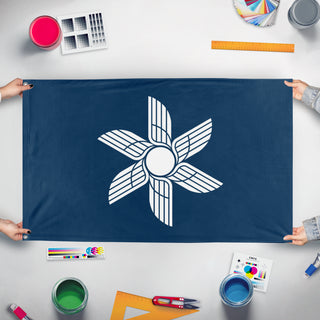 A mockup of the custom flag 'r flag' held up on a table during print checking