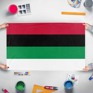 A mockup of the custom flag 'Arab  flag' held up on a table during print checking