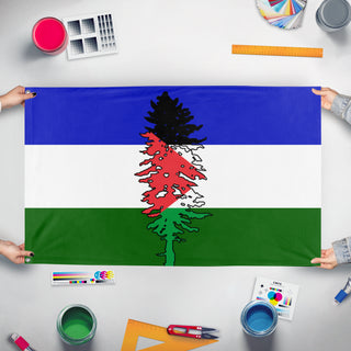 A mockup of the custom flag 'Cascadia for Palestine' held up on a table during print checking