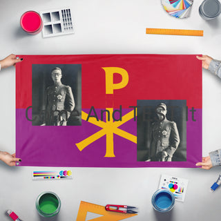 A mockup of the custom flag 'T flag' held up on a table during print checking