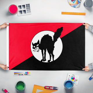 A mockup of the custom flag 'Sabotabby 2.0 flag' held up on a table during print checking