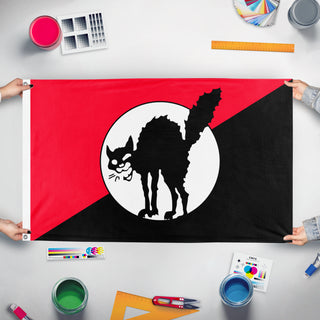 A mockup of the custom flag 'Sabocat 3.0 flag' held up on a table during print checking