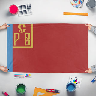 A mockup of the custom flag 'Vyrmenshov flag' held up on a table during print checking