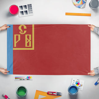 A mockup of the custom flag 'vyrm flag' held up on a table during print checking