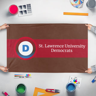 A mockup of the custom flag 'St. Lawrence University Democrats Flag' held up on a table during print checking