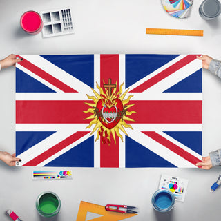 A mockup of the custom flag 'Sacred Heart of Britain flag' held up on a table during print checking