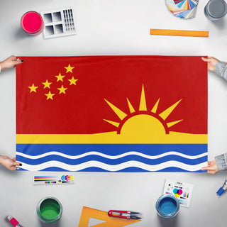 A mockup of the custom flag 'Peoples Commonwealth of Columbia flag' held up on a table during print checking