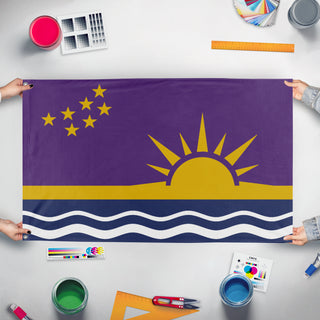 A mockup of the custom flag 'United Commonwealth of Columbia flag' held up on a table during print checking