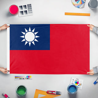 A mockup of the custom flag 'Republic of China' held up on a table during print checking