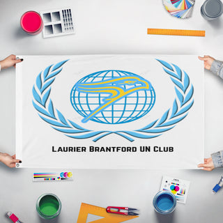 A mockup of the custom flag 'LBUN flag' held up on a table during print checking