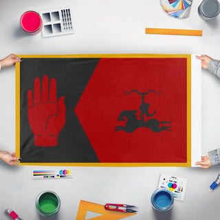 A mockup of the custom flag 'Askivari flag' held up on a table during print checking