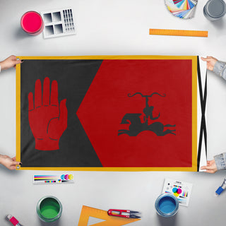 A mockup of the custom flag 'Ashkavari flag' held up on a table during print checking