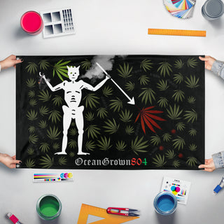 A mockup of the custom flag 'OceanGrown804 flag' held up on a table during print checking