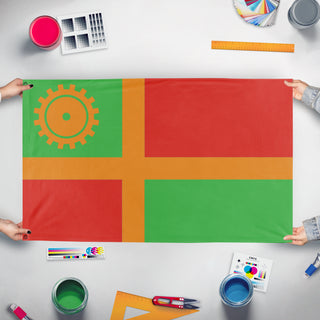 A mockup of the custom flag 'New Rearendia flag' held up on a table during print checking
