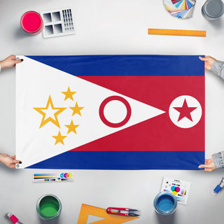 A mockup of the custom flag 'Communist Treaty flag' held up on a table during print checking