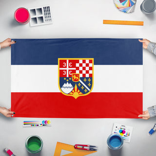 A mockup of the custom flag 'Kingdom of Yugoslavia flag' held up on a table during print checking